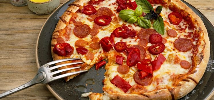 L’impact des franchises de pizza sur la cuisine rapide : un phénomène savoureux